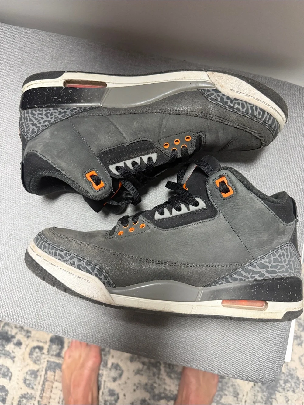 Retro 3 Jordan Men’s Black Sneakers with Orange Jumpman Accents